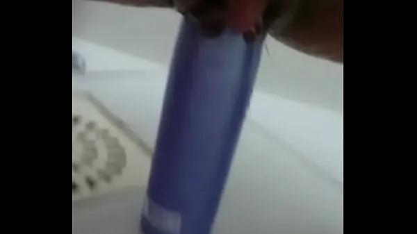 Fresh Stuffing the shampoo into the pussy and the growing clitoris mega Clips